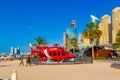 Red helicopter on JBR Beach and Dubai Marina UAE Royalty Free Stock Photo