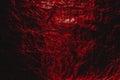 Red hellish grunge abstract crumpled aluminum, Halloween foil background