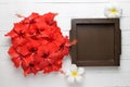 red Hibiscus flowers on white wood table background with space f Royalty Free Stock Photo