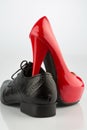 Red high heels and men's shoe