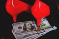 Red high heels, money and a black panties in a black background. Royalty Free Stock Photo