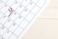 Red highlighter with ovulation day mark on calendar,