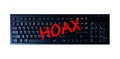 Red Hoax word on keyboard button top view. Computer keyboard key with danger sign with words Internet Hoax. Royalty Free Stock Photo