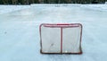 Red hockey net on outside ice rink Royalty Free Stock Photo