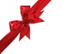 Red holiday bow on white background