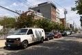 Red Hook Brooklyn Street with Parked Cars and Old Brick Buildings in New York City Royalty Free Stock Photo