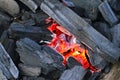 Red-hot charcoal briquettes Royalty Free Stock Photo