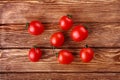 Red hot cherry and chili peppers over on wooden table Royalty Free Stock Photo