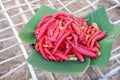 Red hot chili on banana leaf for sale in market, Thailand.