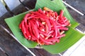 Red hot chili on banana leaf for sale in market, Thailand.