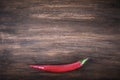 Red hot chili pepper on brown background. Toned Royalty Free Stock Photo