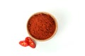 Red hot chili pepper powder and slices isolated on white background Royalty Free Stock Photo