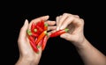 Red hot chili pepper in woman's hands Royalty Free Stock Photo