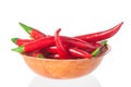 Red hot chili peppers in a bowl on white background Royalty Free Stock Photo