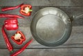 Red Hot Chili Peppers, paprika and pan on vintage wooden. Top view with copy space. Royalty Free Stock Photo