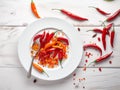 Red hot chili peppers on a white wooden background. Top view. Made with Generative AI Royalty Free Stock Photo