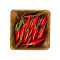 Red hot chili peppers in wooden bowl Royalty Free Stock Photo
