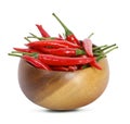 Red hot chili peppers in wooden bowl on white background Royalty Free Stock Photo