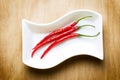 Red hot chili on wood table Royalty Free Stock Photo
