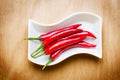 Red hot chili on wood table Royalty Free Stock Photo