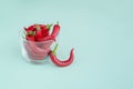 Red hot chilli pepper in glass jar