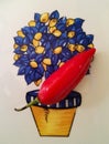 Red hot chilli pepper over a ceramic plate with a blue and yellow decoration Royalty Free Stock Photo