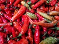 Red hot chilli peppers at the market ready for sale. Royalty Free Stock Photo