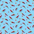 Seamless pattern made of red chili or chilli on blue background. Minimal food pattern. Red hot chilli seamless peppers pattern. Royalty Free Stock Photo