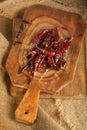 Red hot chillies pepper on wooden board Royalty Free Stock Photo