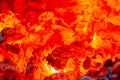 Red hot coals in a blast furnace for metal melting. metal mining and processing industry. Red coals from a burnt fire Royalty Free Stock Photo
