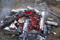 Red hot coals closeup background. luminous charcoal briquettes Royalty Free Stock Photo