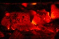 Red hot coals in fireplace Royalty Free Stock Photo