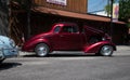 Red hotrod at an outdoor car show in Montana