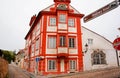 Red house on the cobbled streets Royalty Free Stock Photo