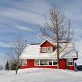 Red house in cold snowy winter, Iceland