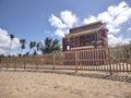 Red house construction Playa Espinar Beach Aguada Puerto Rico red house sand trees island life
