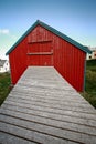 Red house with footbridge Royalty Free Stock Photo