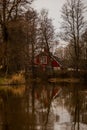 Red house near a river Royalty Free Stock Photo