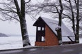 Red house, pond, trees and crack - winter time