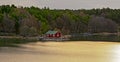 Red house on rocky shore of Ruissalo island, Finland Royalty Free Stock Photo