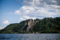 The red house stands on top of a cliff. Royalty Free Stock Photo