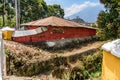 Red house with volcano behind, Antigua, Guatemala Royalty Free Stock Photo