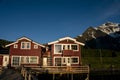 Red houses on fjord shoreline Royalty Free Stock Photo