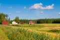 Red houses in a rural landscape Royalty Free Stock Photo