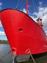 Red Lighthouse mounted atop a ship Royalty Free Stock Photo