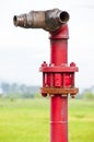 Red hydrant pipe. Royalty Free Stock Photo