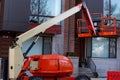 red hydraulic utility lift used in the construction industry machine mobile crane