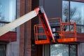 red hydraulic utility lift used in the construction industry mobile heavy