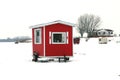 Red ice fishing cabin