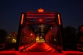 Red Illuminated Bridge at Night - Urban Metalwork Perspective Royalty Free Stock Photo